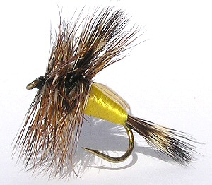 Yellow Humpy dry fly for rough water Brown trout fishing